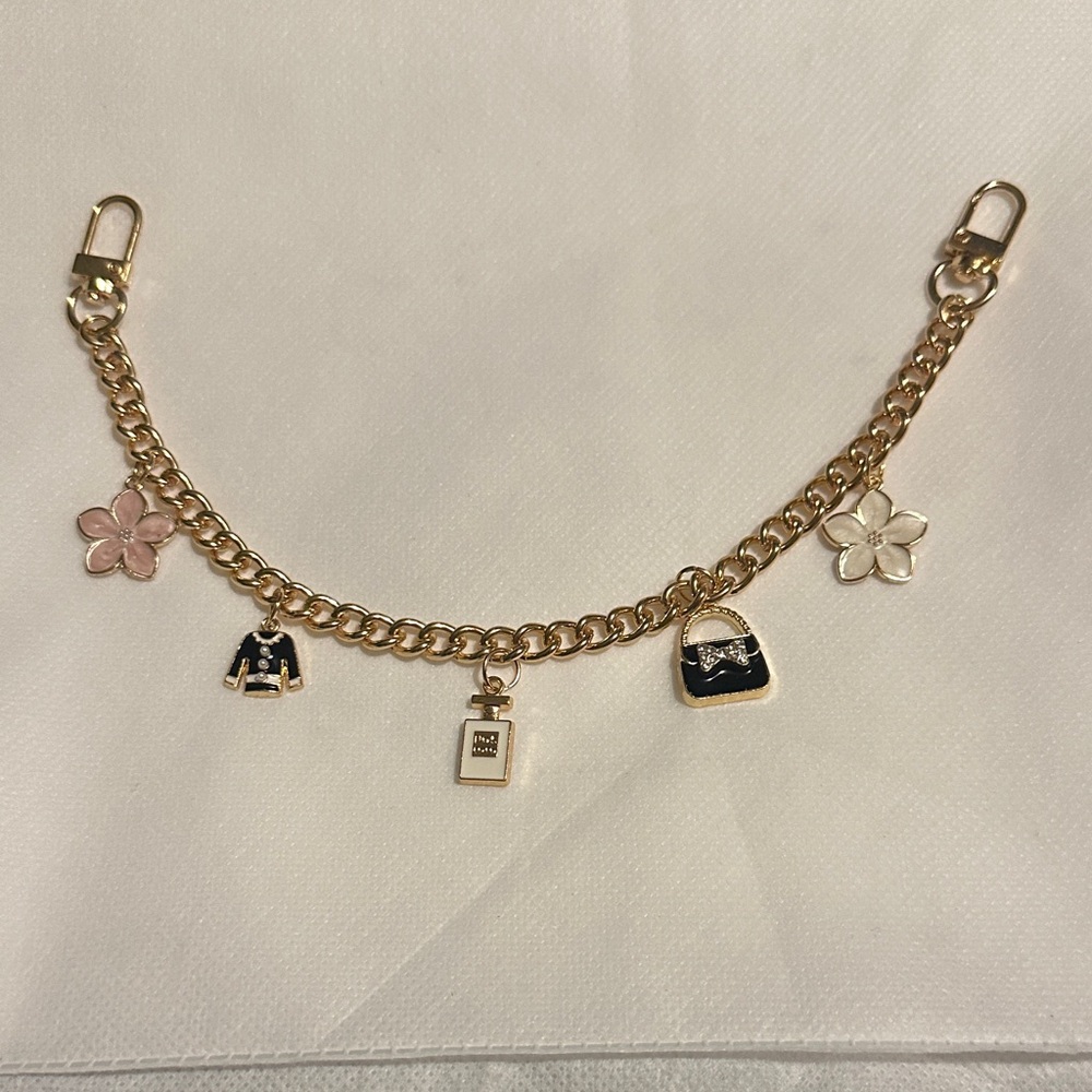 Unbranded Gold Bag Charm with Pink and Black Accents
